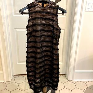 Sleeveless cocktail dress from jcrew. Fun details.